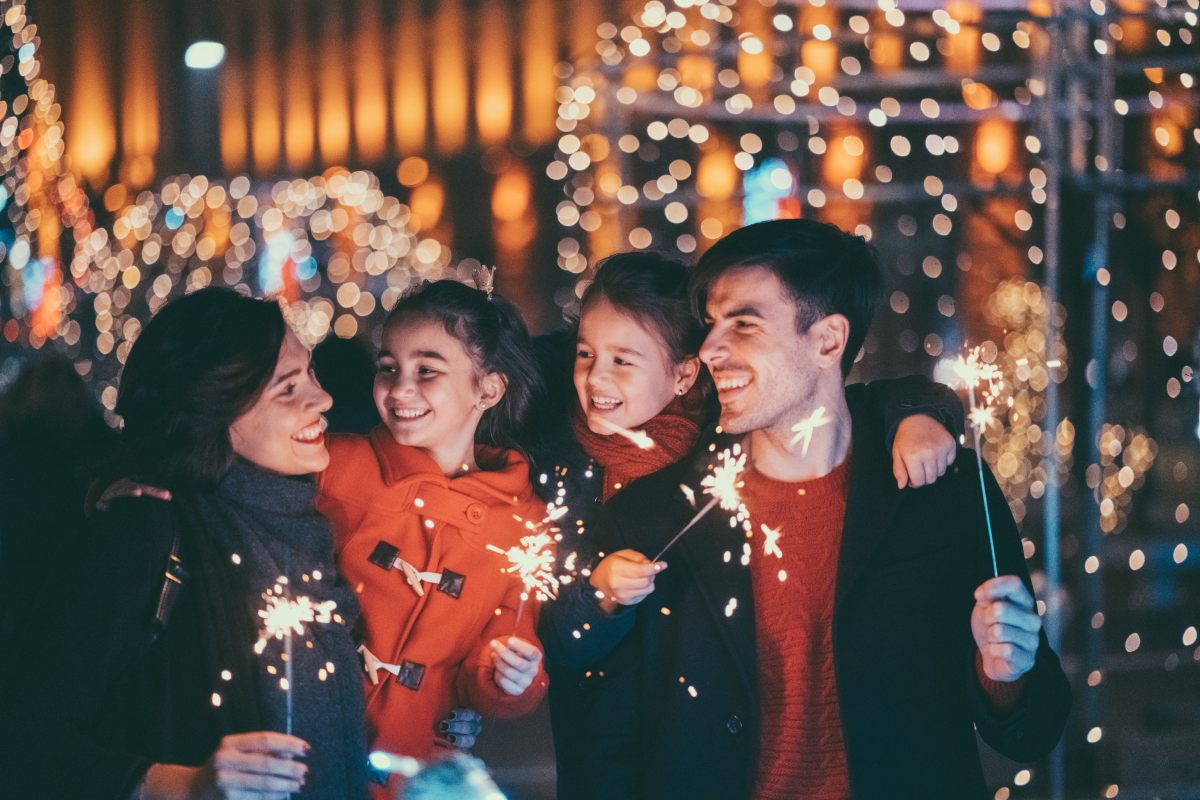 Family celebrating on New Year's Eve © iStock