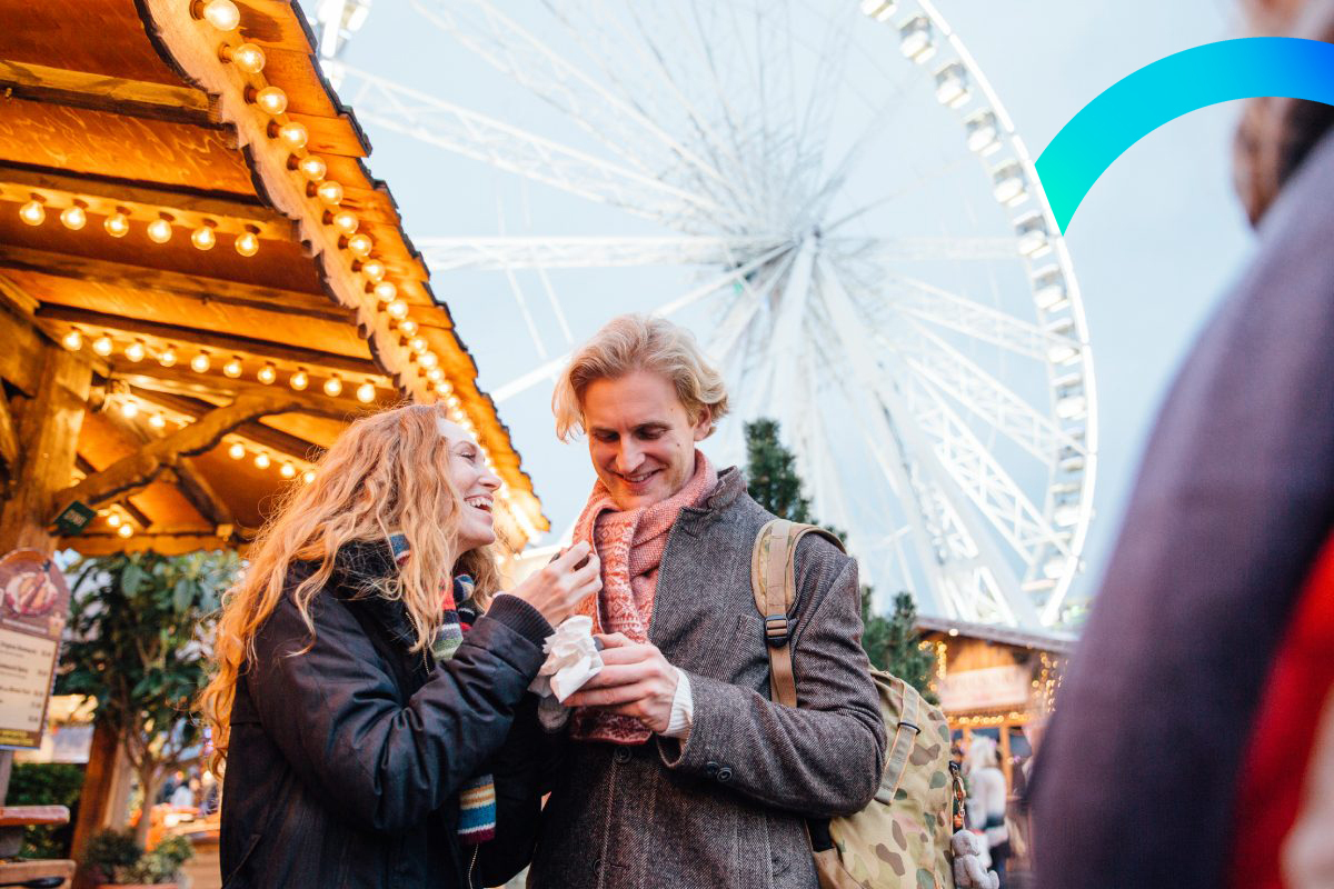 A couple having fun in Winter Wonderland, London © iStock